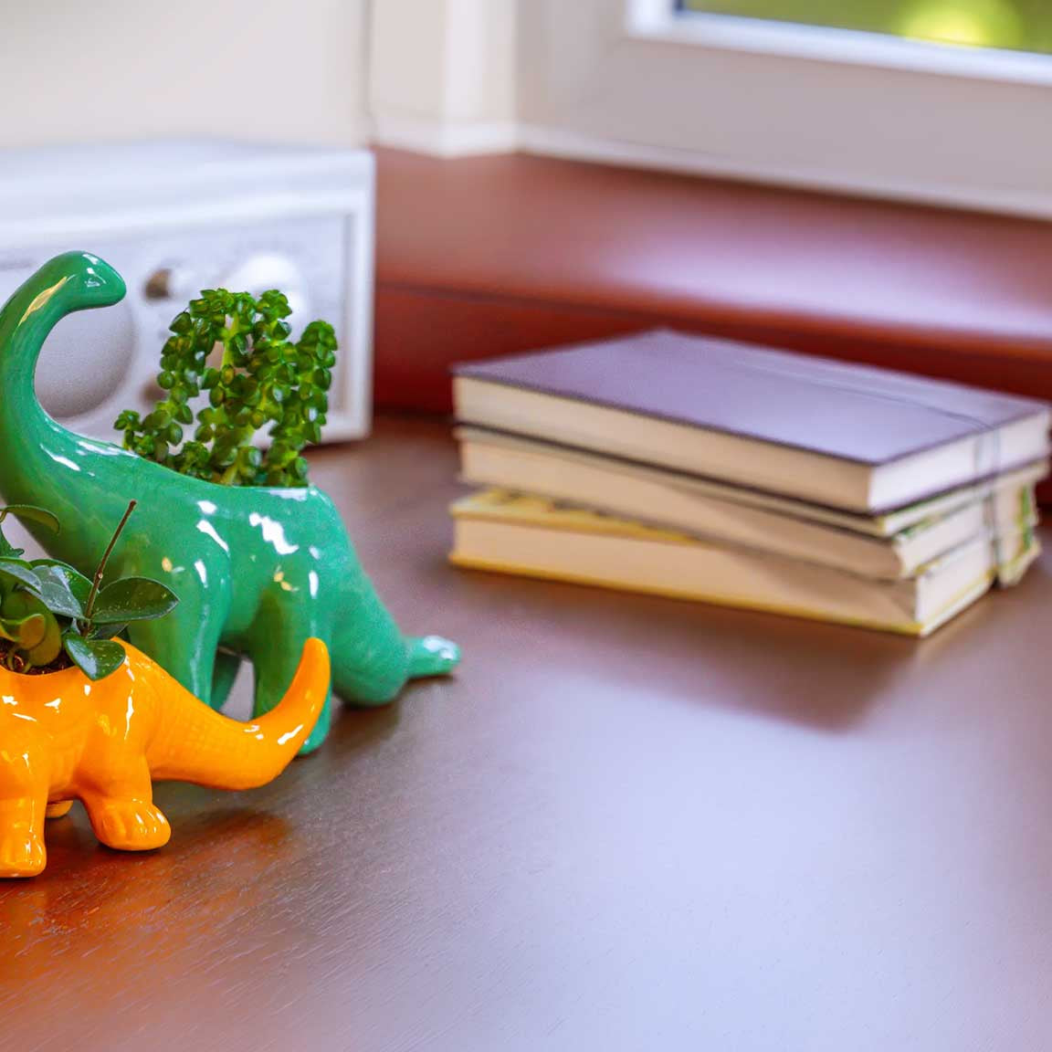 Unique ceramic pots shaped like animals, holding succulents — by Chive Studio
