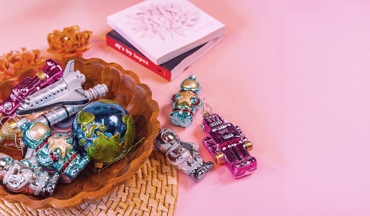Space ornaments for a christmas tree in blown glass, grouped together — by Chive Studio