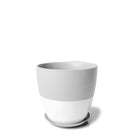 A simple white Dyad Porcelain Modern Indoor Plant Pot with Saucer from Chive Studio 2024, with a matte gloss finish and a subtle base, isolated on a white background.