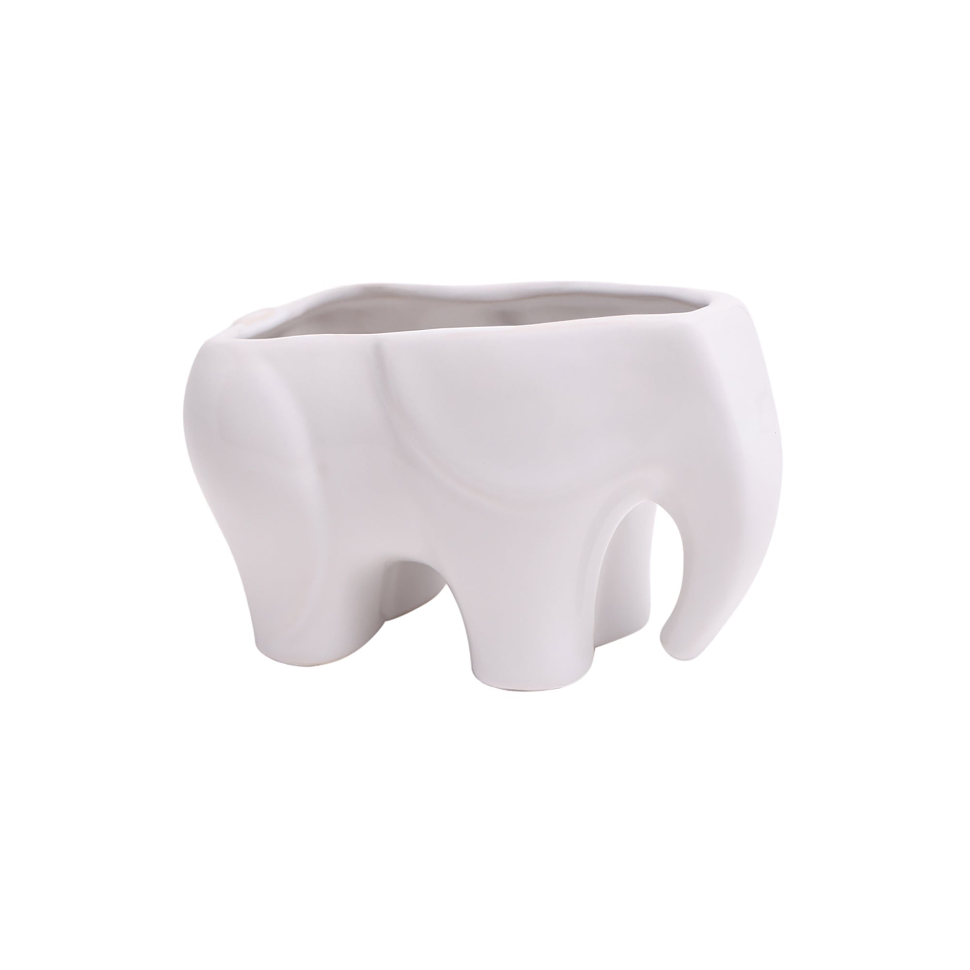 A white ceramic planter in the shape of a sad elephant, isolated on a white background. The Elephant Ceramic Indoor Plant Pot For Succulents hollow in the elephant's back is intended for holding a plant.