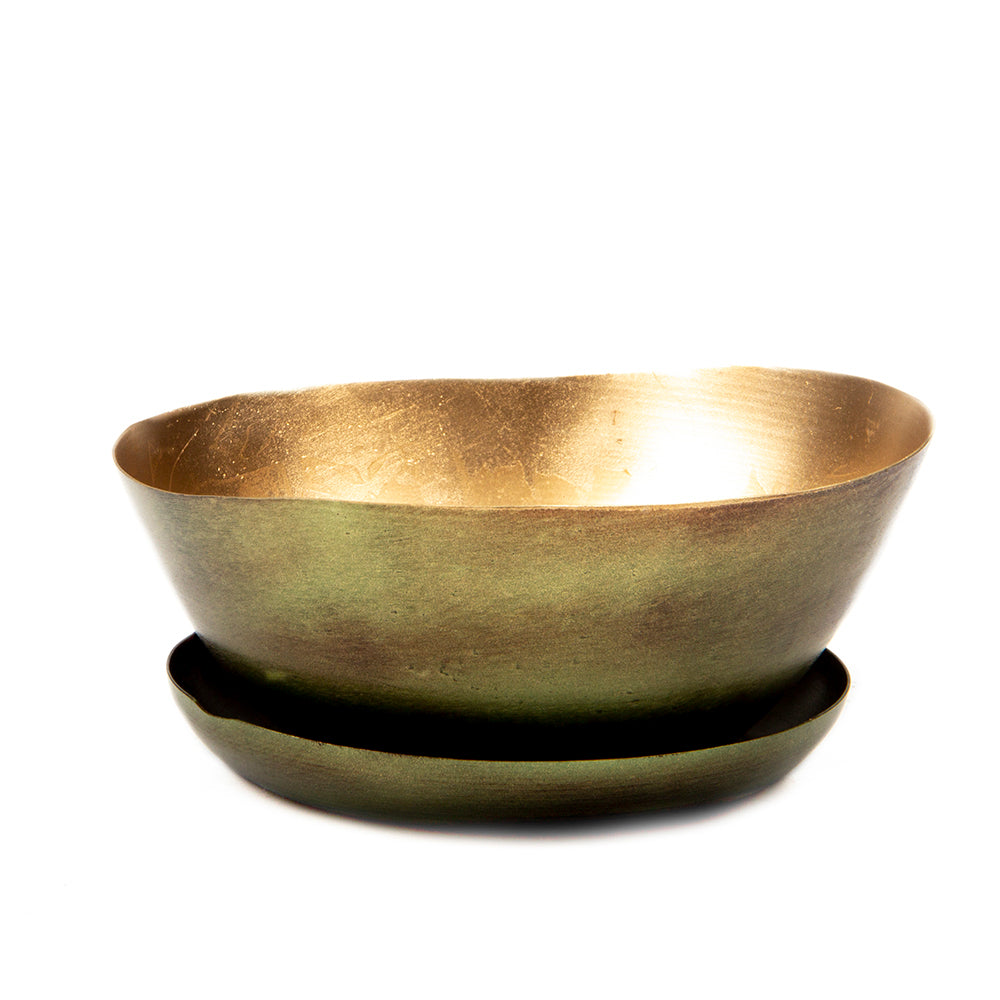 A Topper Metal Succulent Dish by Chive Studio 2024 on a matching cushion, both lit evenly against a plain white background. The dish, crafted with electroplating, shows a smooth, reflective interior and a textured exterior.